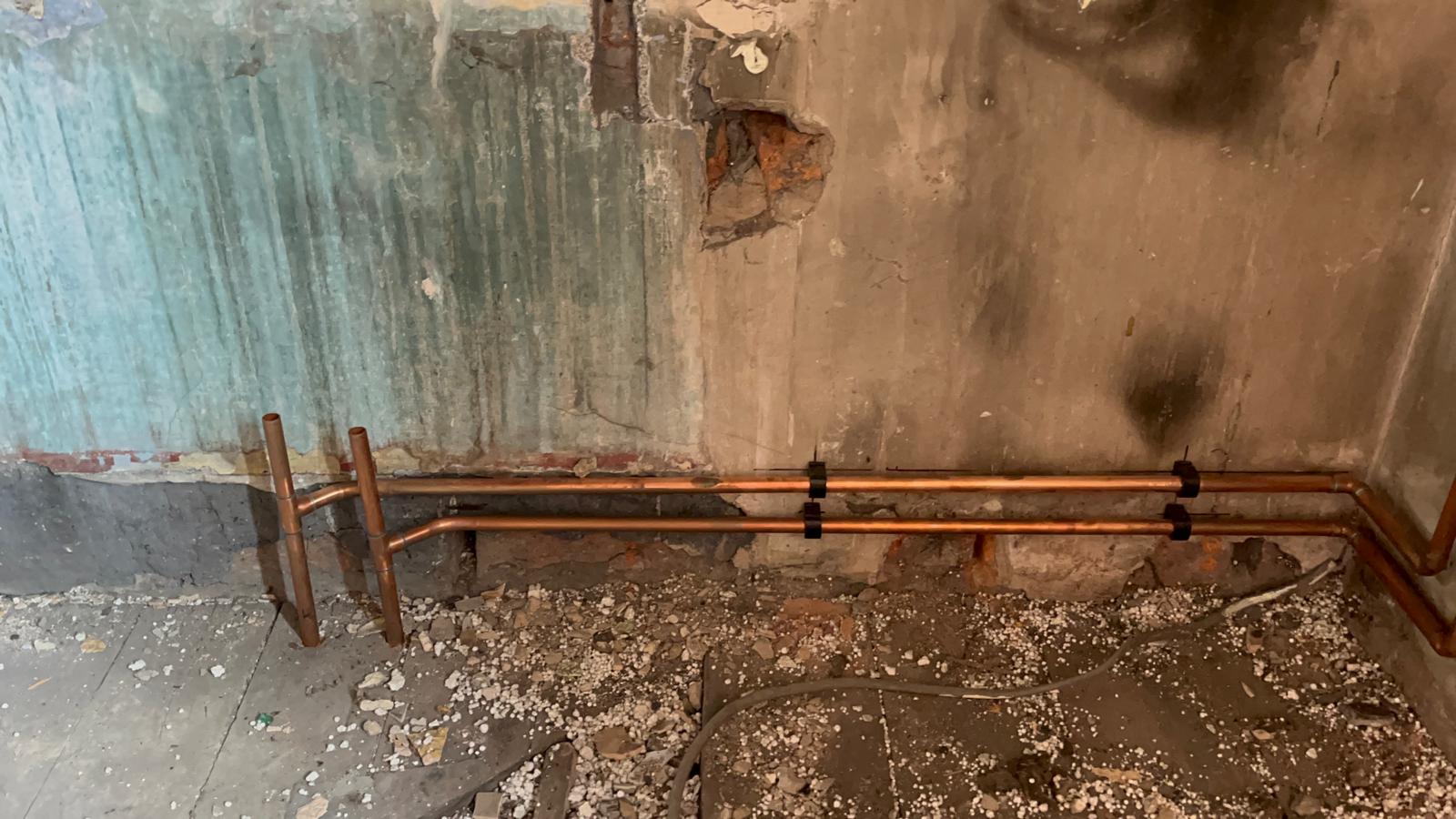Long run of copper flow and return pipework installed for a new central heating system
