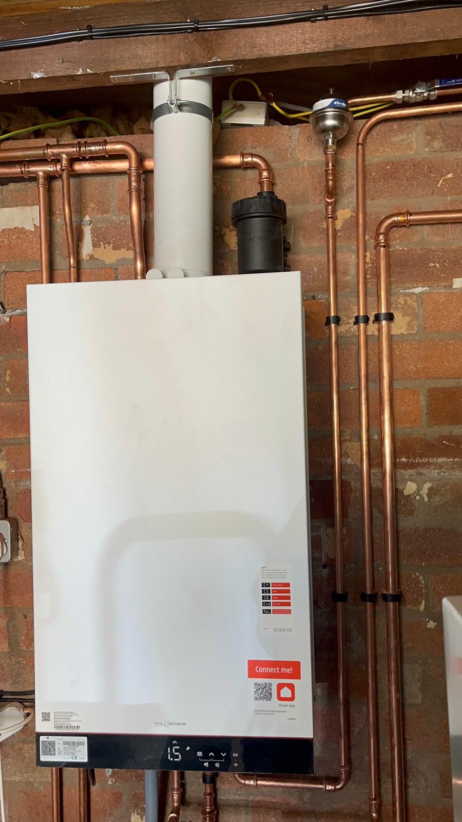 Viessmann boiler with air separator, magnetic system filter and clipped copper pipework