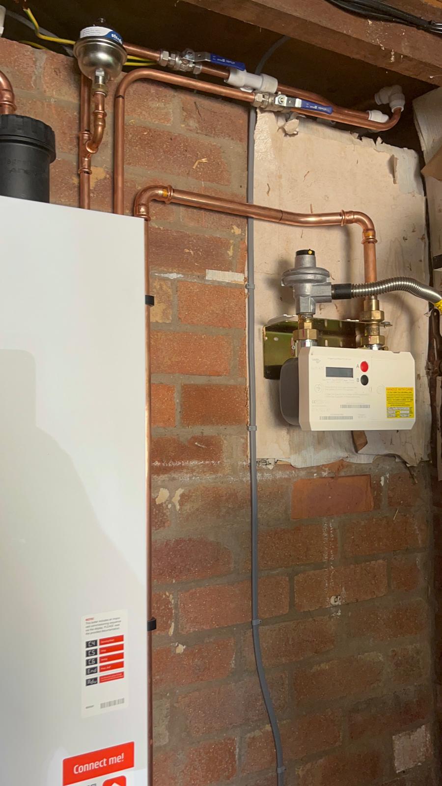 Gas meter, regulator and flexible connection with new copper gas pipework by a Gas Safe engineer