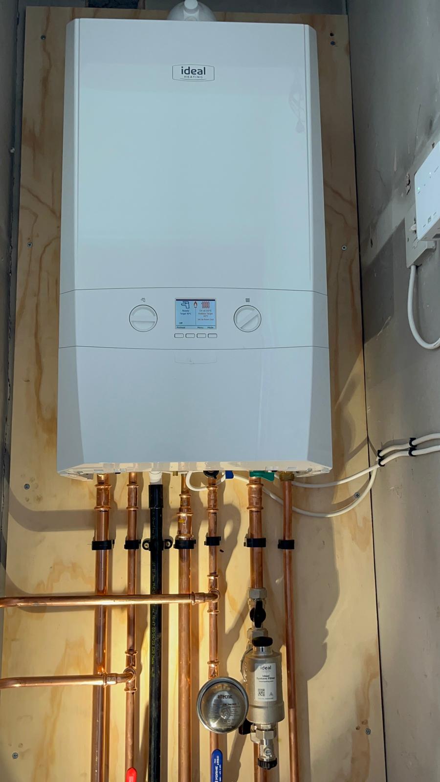 Ideal Heating boiler installation with system filter and copper pipework