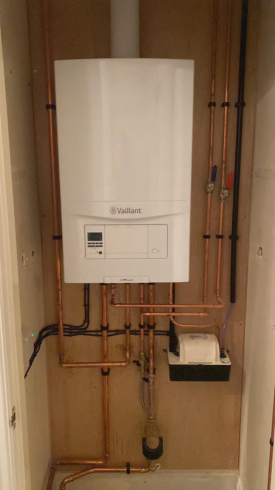 Vaillant ecoTEC pro boiler installed with copper pipework and condensate pump
