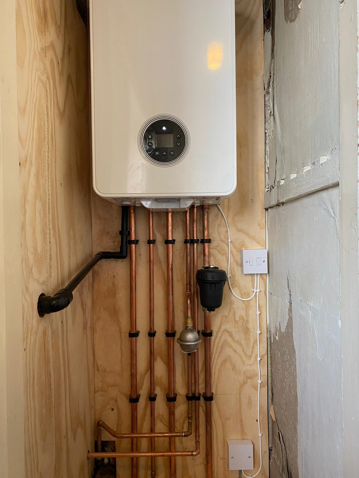 Worcester Bosch boiler installation with magnetic filter and neat copper pipework